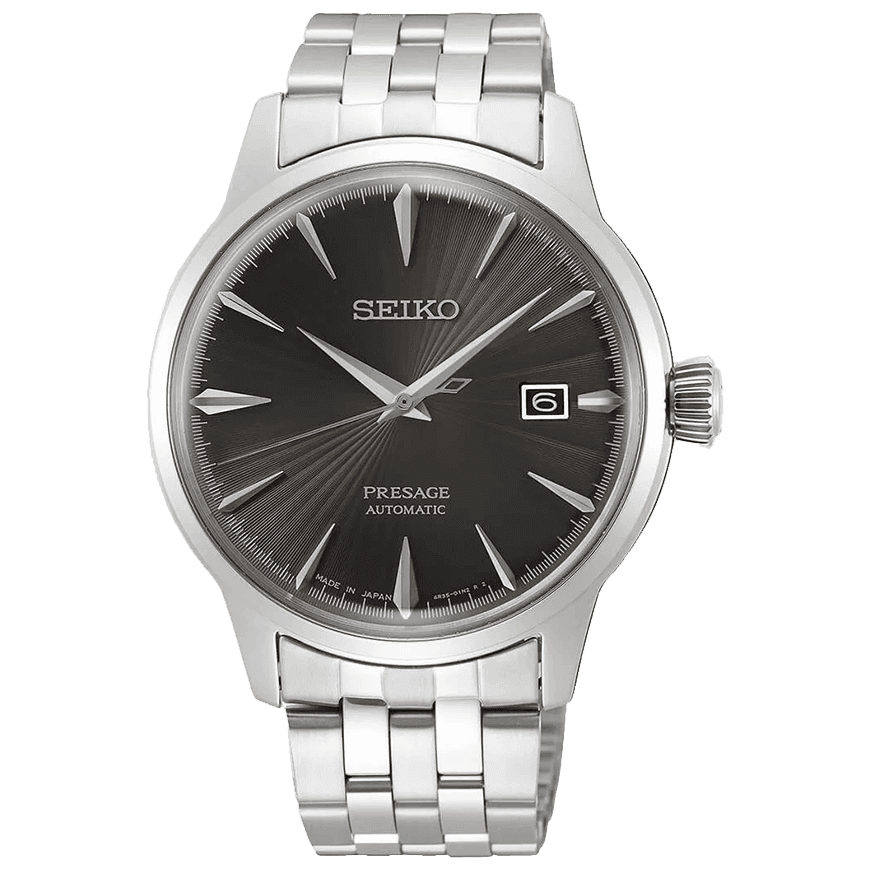 Seiko Presage med sølvfarget stållenke, sort urskive med solstrålemønster, sølvfargede markører og datovisning klokken tre.